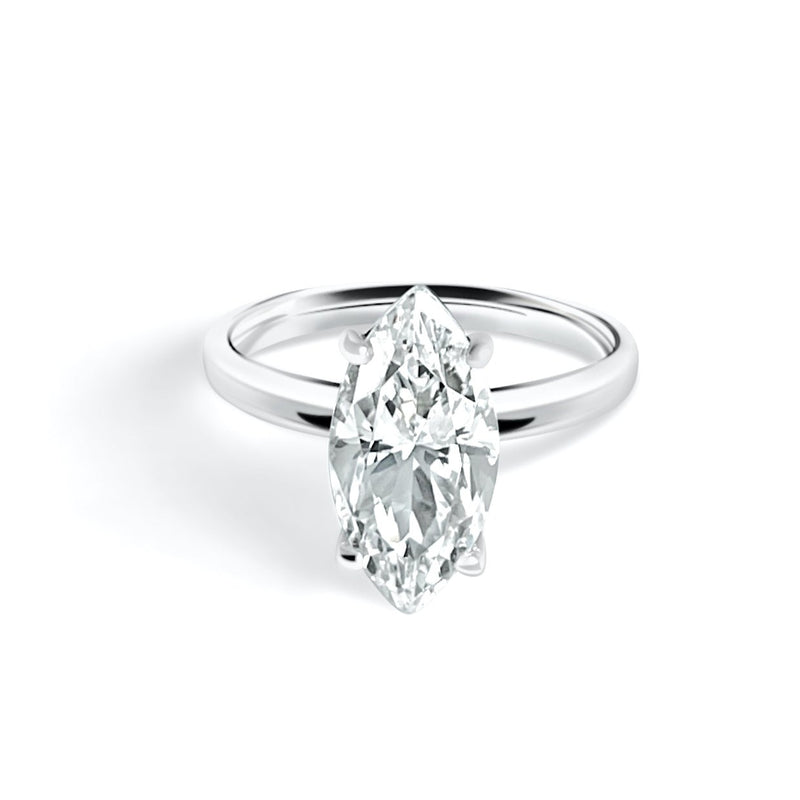 Classic four-prong solitaire diamond engagement ring 