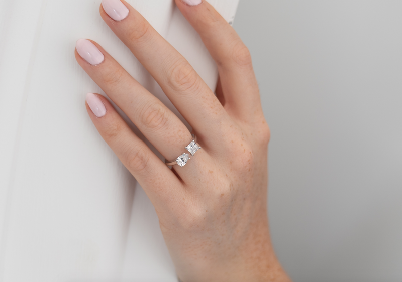 The most beautiful Hestia diamond Toi et Moi ring created with pear cut diamond and princess cut diamond