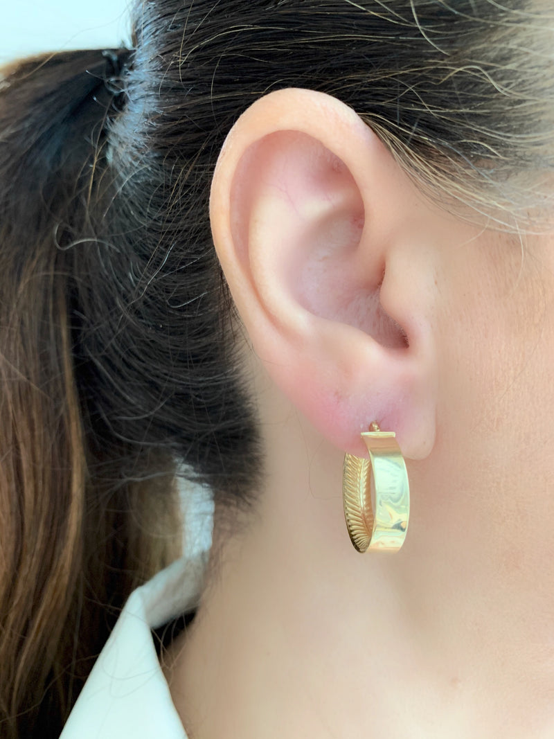 Revolve Gold Design Hoop Earrings